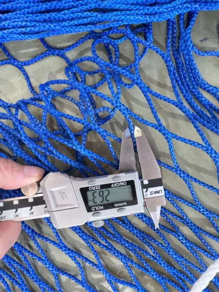 Reinforced seams and customized Netting mesh size of a deep-sea fish cage net.