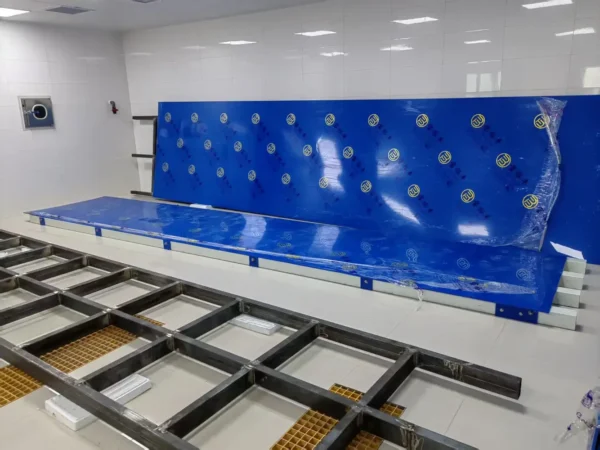 Exploded view of a modular reservoir coupled RAS, showcasing aquaculture pond, mechanical filtration, biological filter, and regulating reservoir unit.