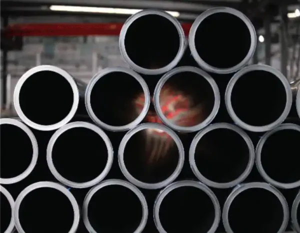 HDPE water pipes stacked for delivery, compliant with GB/T13663.2 standard.